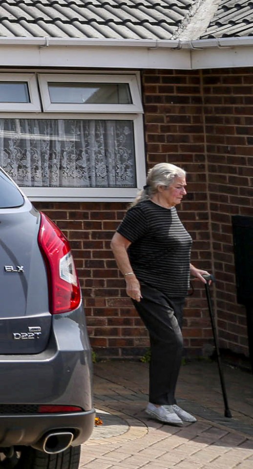 Irene Lee outside her home in Sheffield