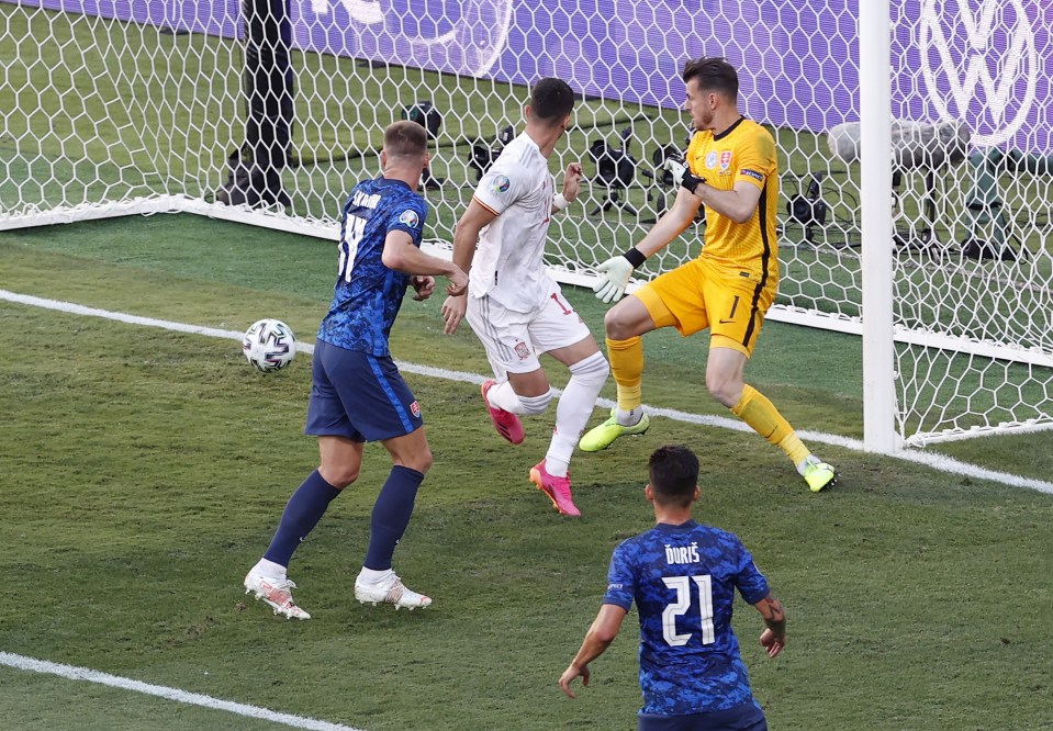 Ferran Torres watches as he puts the Spaniards 4-0 in front