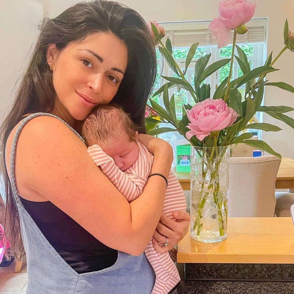 Casey Batchelor looked stunning with no make-up on as she cradled baby Daisy