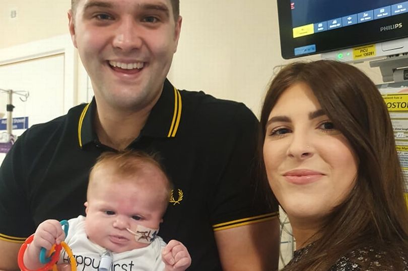 Baby Ellis with mum Savannah and dad James,28