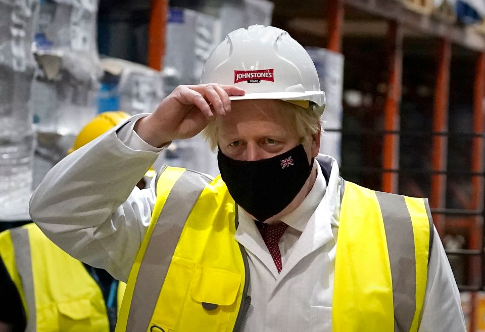 Boris Johnson on a visit to a paint factory in Batley and Spen this morning