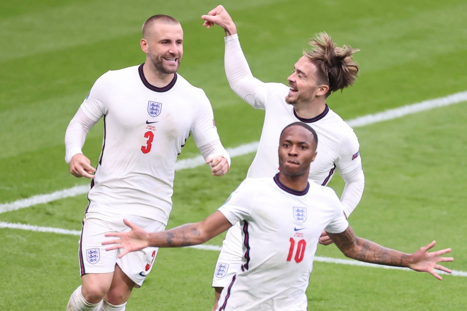 Raheem Sterling celebrates England's opening goal