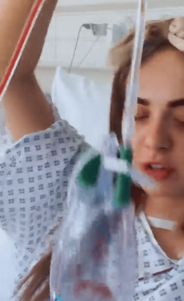 Demi showed the tube that's draining blood from her neck