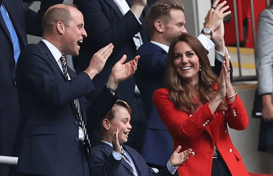 Prince George smiled and clapped as England beat Germany at yesterday's match