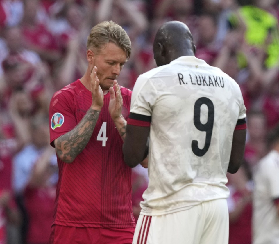 Belgium striker Romelu Lukaku with Denmark captain Simon Kjaer