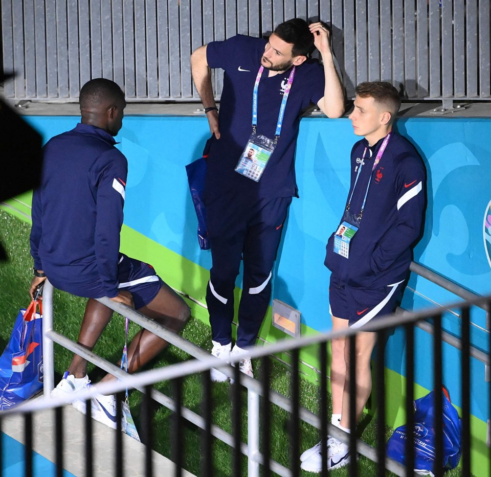 France captain Hugo Lloris having a chat with team-mates after the loss