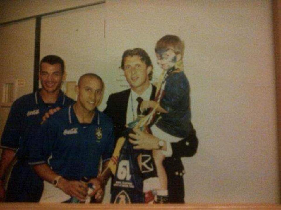 The former defender and his son posing with Cafu and Roberto Carlos after Scotland's clash with Brazil at France '98