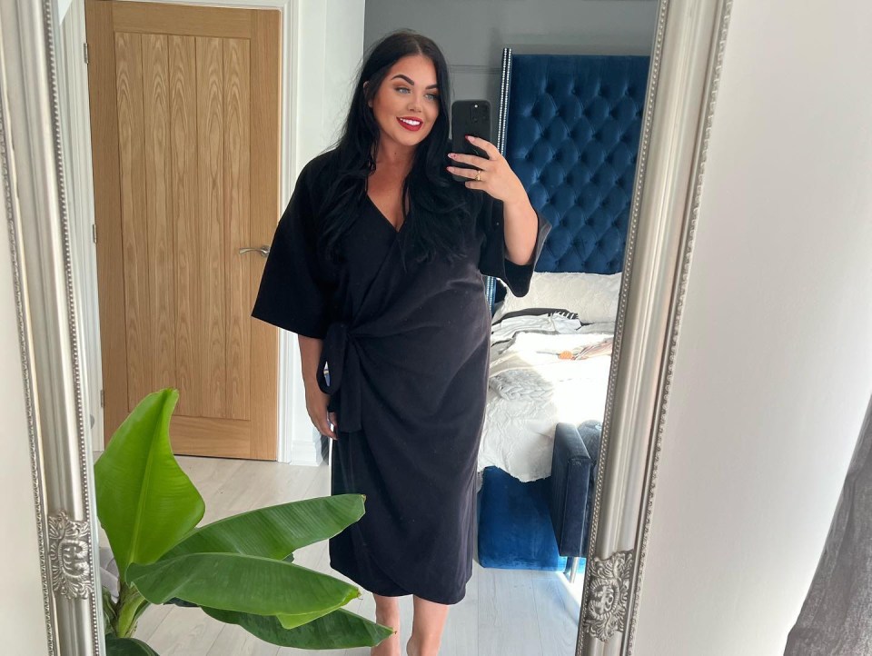 Scarlett Moffatt looked glamourous in a black wrap dress on Christmas Day