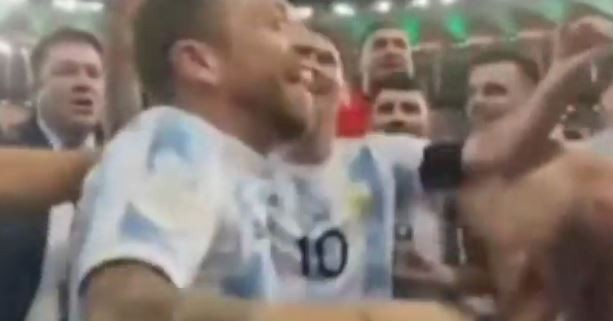 The Argentina squad sing and dance on the Maracana pitch after beating Brazil