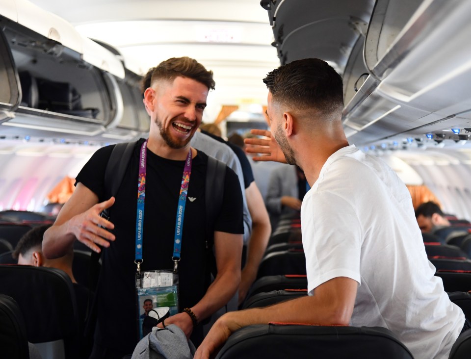 Italian stars Jorginho and Leonardo Spinazzola share a laugh after landing in the capital