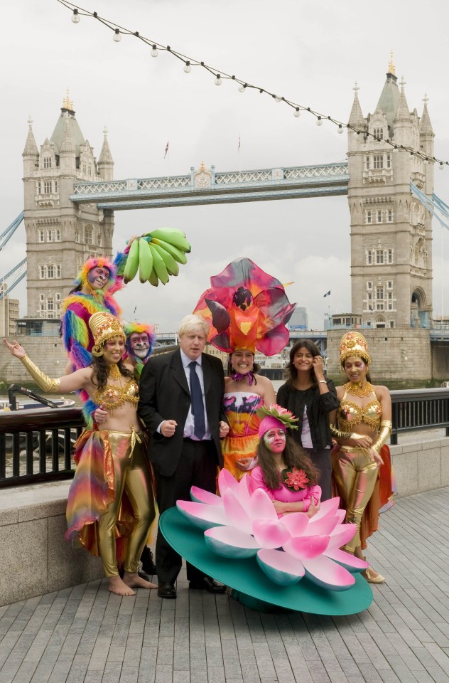 Boris posed with actors in bare-bottomed rainbow monkey costumes complete with a fake penis