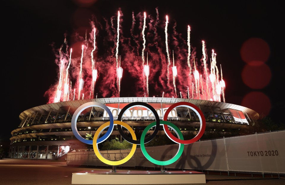 Just 950 VIPs gathered inside the 68,000-seat Olympic Stadium in Tokyo