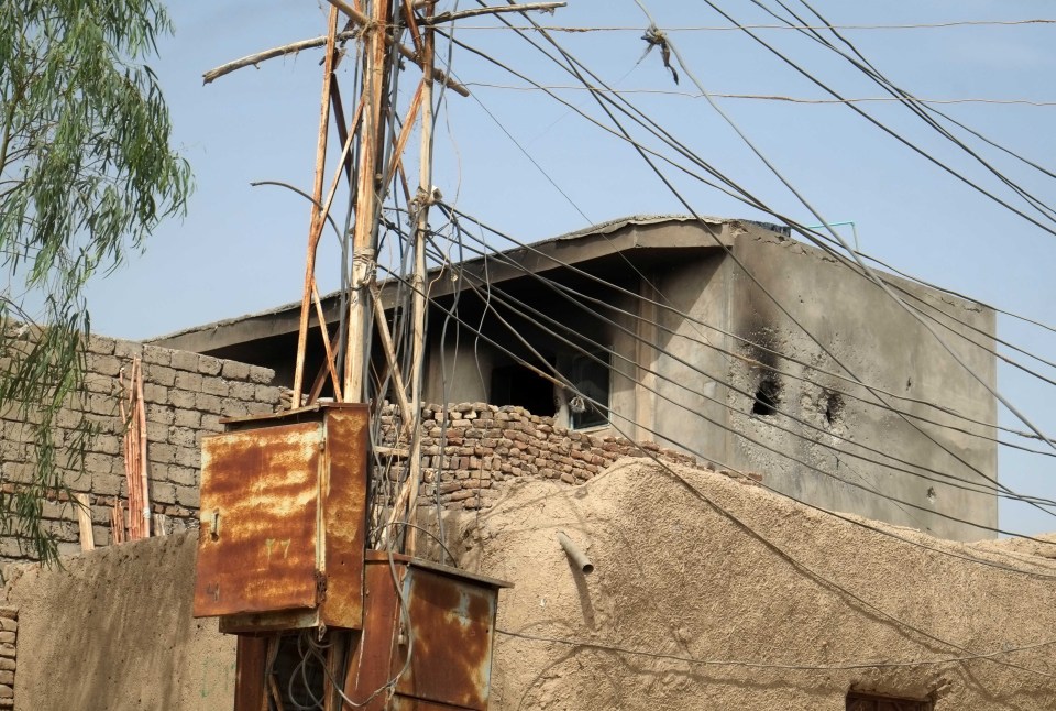 A damaged wall after US forces conducted an airstrike in Kandahar