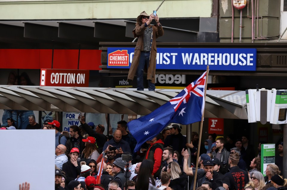 Protesters gather at Bourke Street Mall during a World Wide rally for freedom