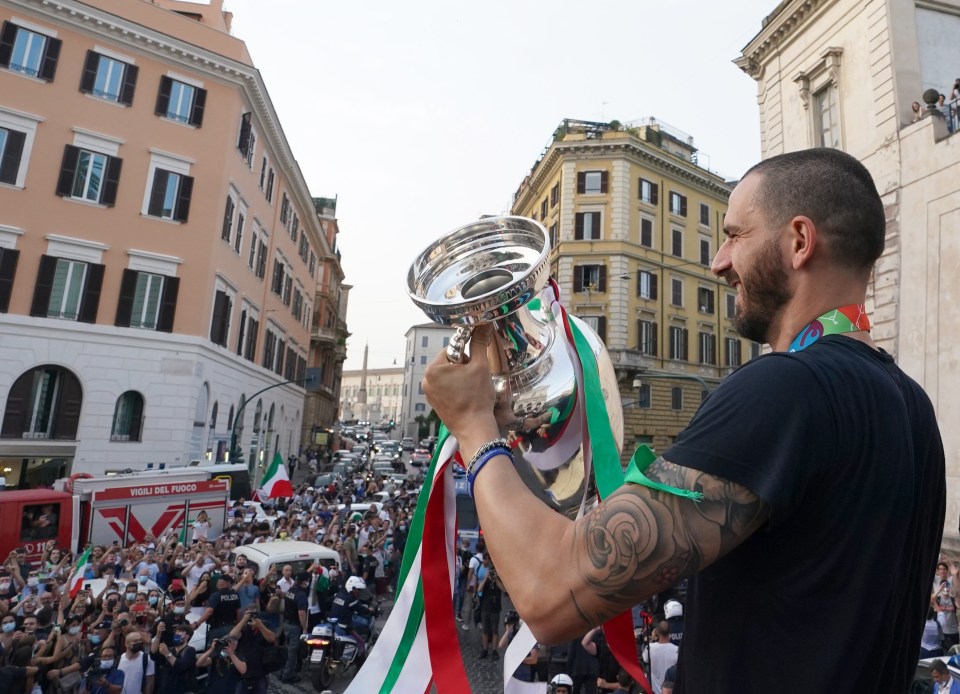 Leonardo Bonucci parades the trophy to the adoring crowd