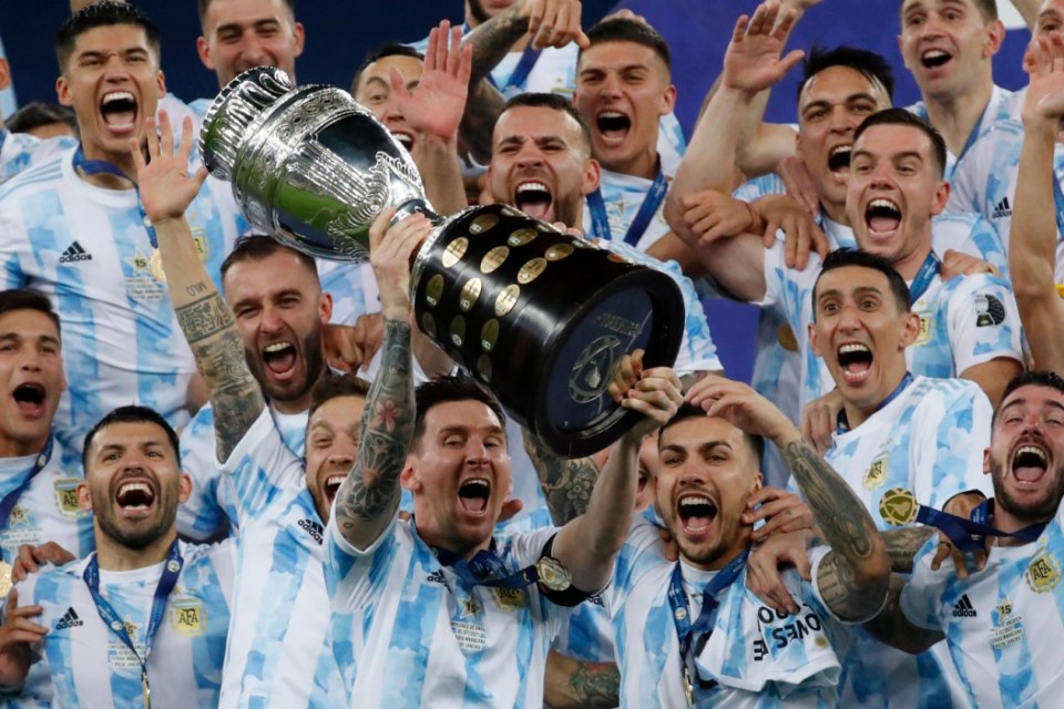 Lionel Messi lifts the Copa America trophy