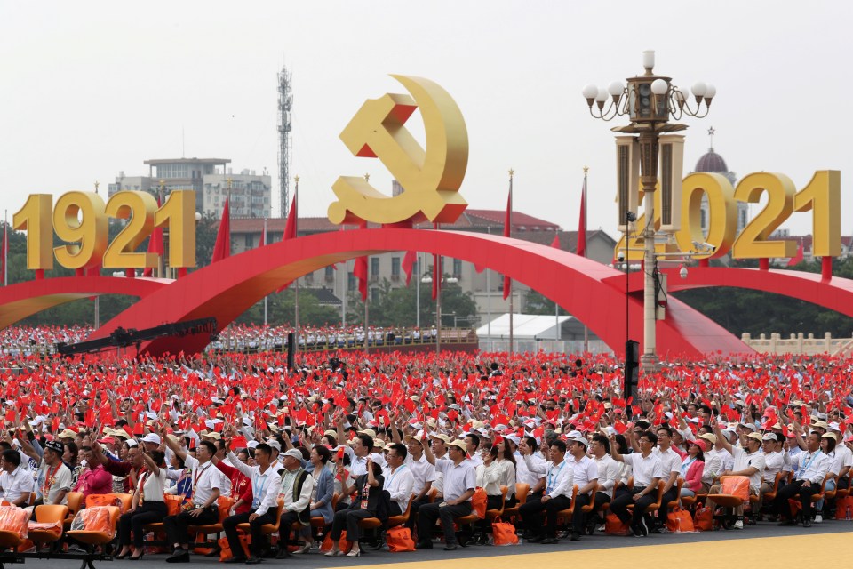 Chinese citizens celebrate the 100th anniversary of the Communist Party