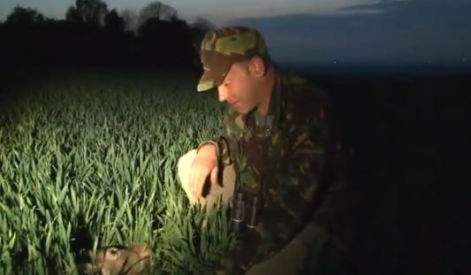 The presenter was kneeling next to the animal after shooting it