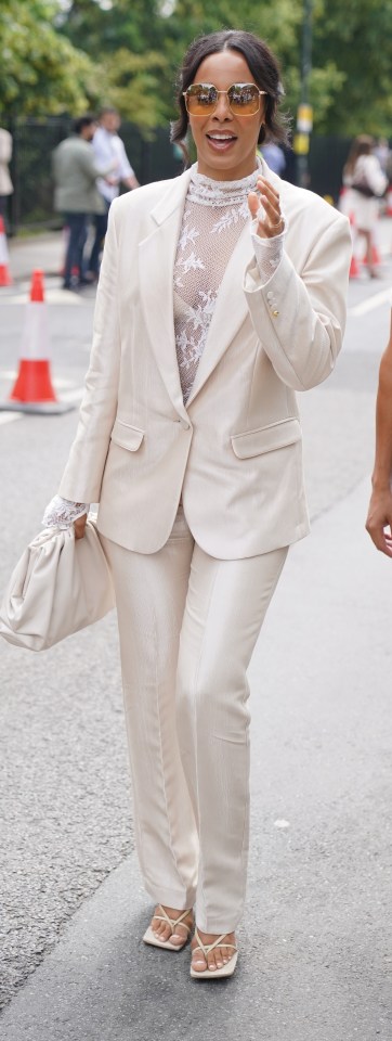 Rochelle wore a white suit with a lace blouse at Wimbledon