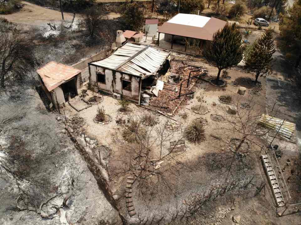 Houses and buildings in the path of the fire were torched