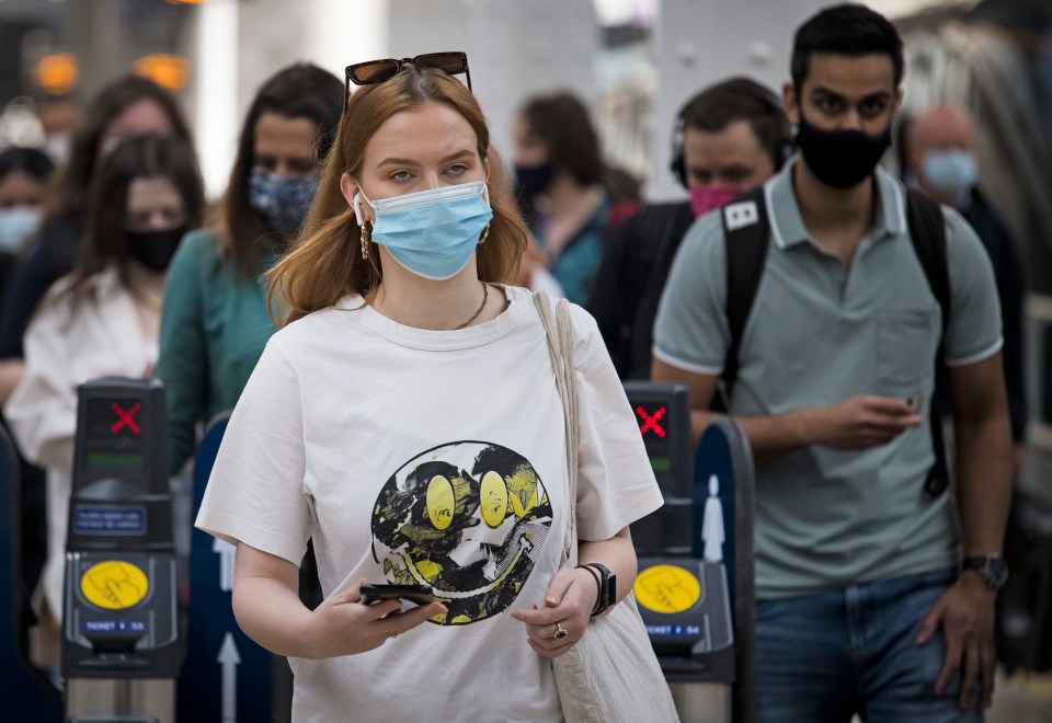 Passengers wearing masks at Paddington station this morning