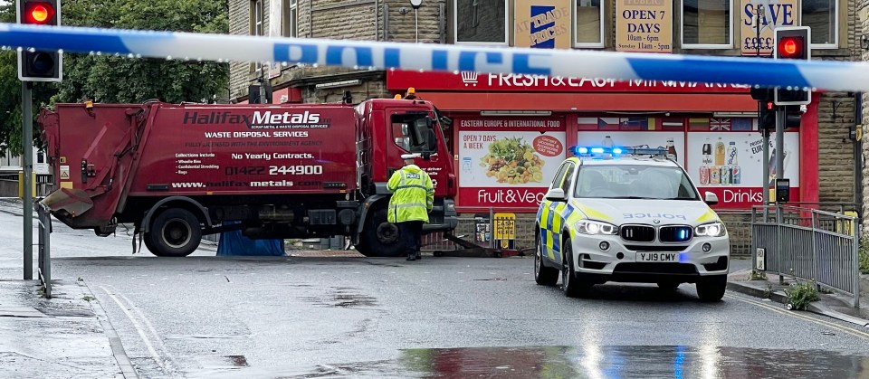 The collision was between the pedestrian and the bin lorry