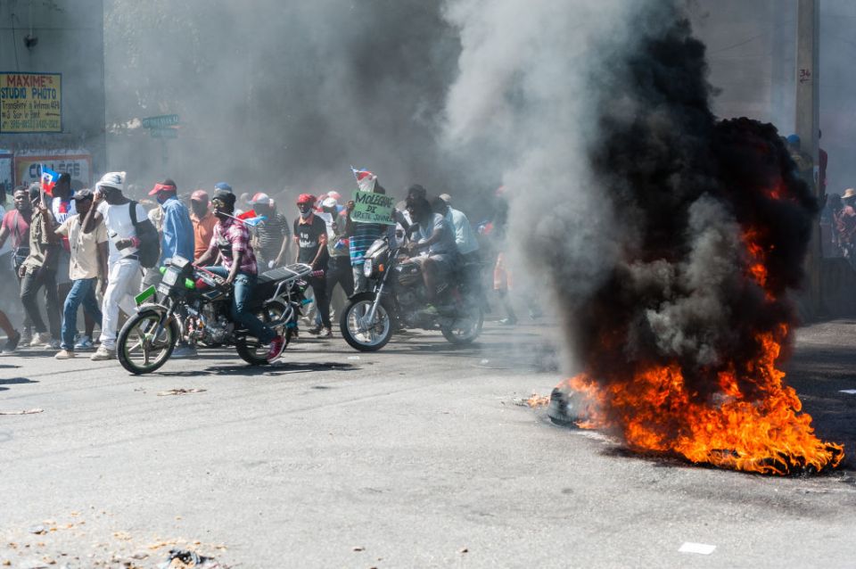 Haitians stage a demonstration in Port-au-Prince on February 14