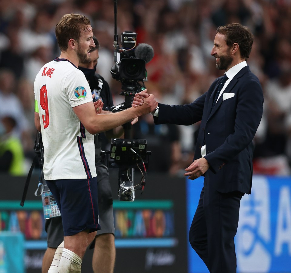 Southgate with match winner Harry Kane after England's win