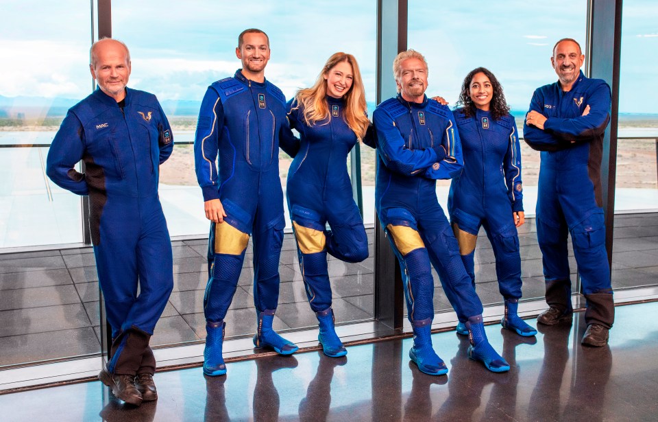 From left, Chief Pilot Dave Mackay, Lead Operations Engineer Colin Bennett, Chief Astronaut Instructor Beth Moses, Founder of Virgin Galactic Richard Branson, Vice President of Government Affairs and Research Operations Sirisha Bandla and pilot Michael Masucci