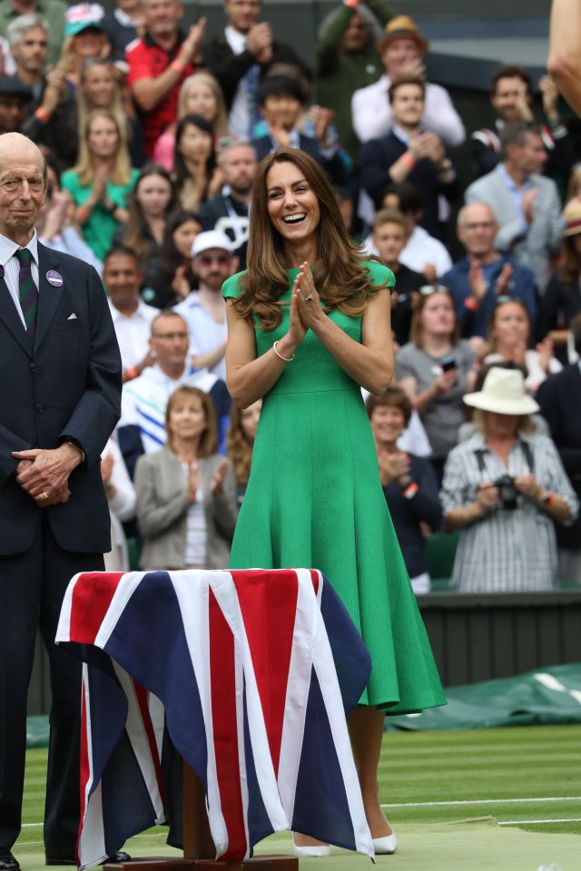 Kate, a keen tennis fan, beamed as the Aussie won the trophy