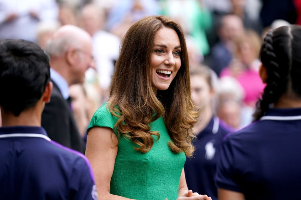 Kate spoke to ball girls and boys as she arrived on centre court