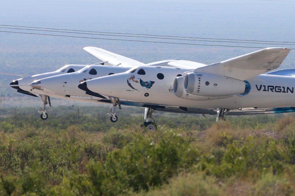 Virgin Galactic's passenger rocket plane VSS Unity, borne by twin-fuselage carrier jet dubbed VMS Eve, takes off