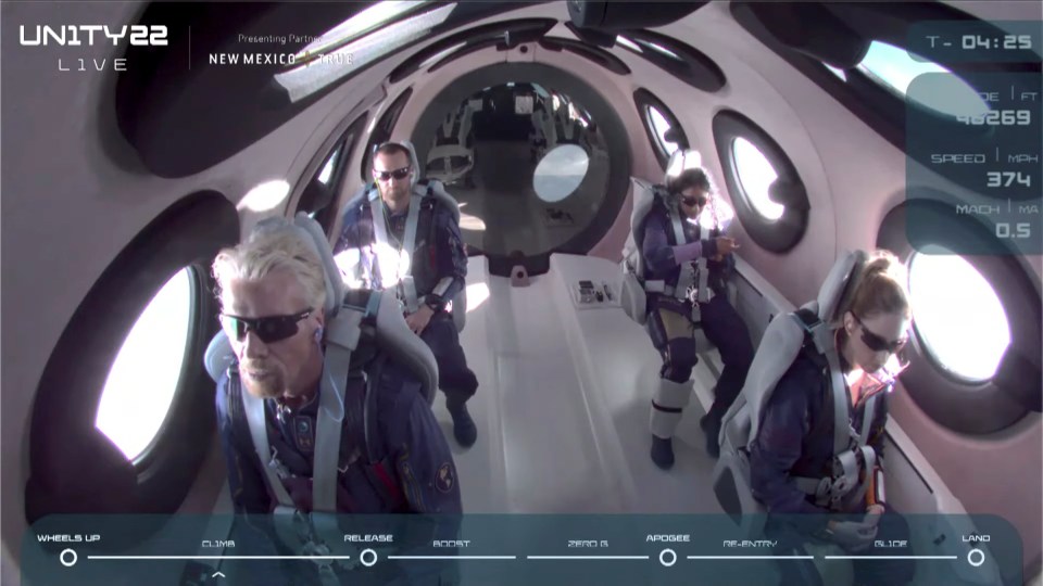 Sir Richard and crew are seen on board Virgin Galactic's passenger rocket plane VSS Unity before starting their untethered ascent to the edge of space