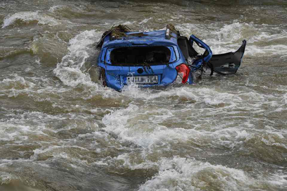 A demolished car is overflooded in Altenahr, Rhineland-Palatinate, western Germany