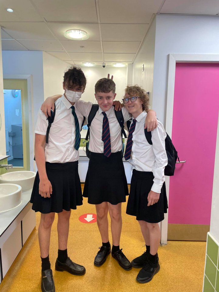 Pupils Connor Humphries, Adrian Copp, and Scott Penman wearing skirts at their school in Cornwall