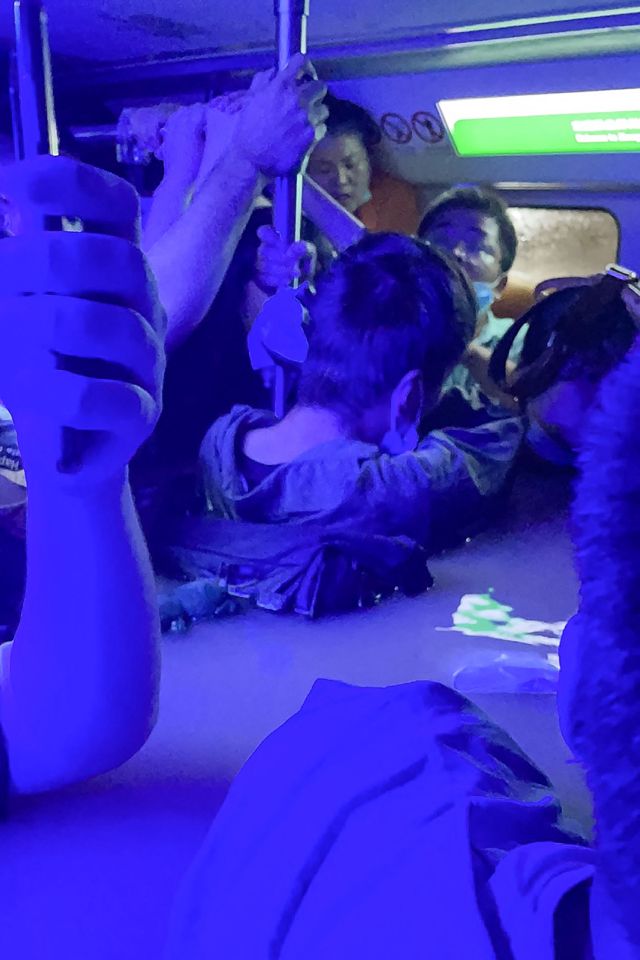 A submerged subway car with passengers following heavy rains in Zhengzhou, China