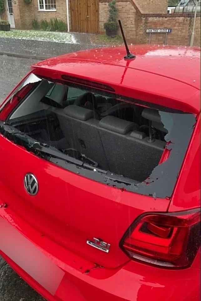 Car windows were smashed and vehicles dented during the freak storm