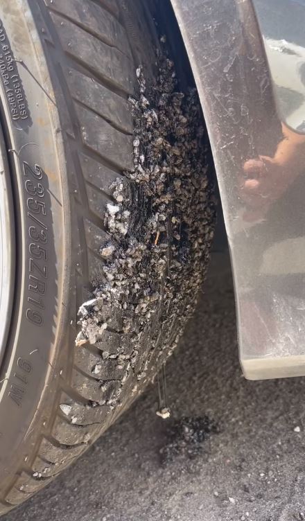 Cars have been left covered in melted tarmac as the temperatures soar