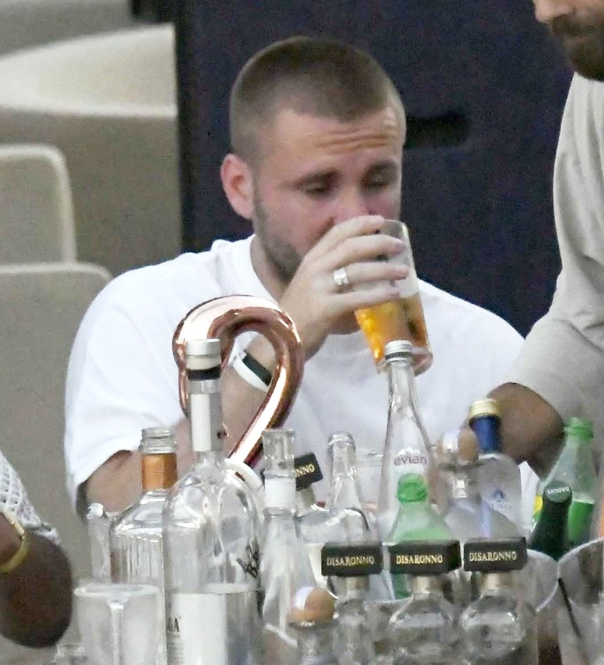 Man Utd left-back Shaw sips a drink at the SantAnna beach club