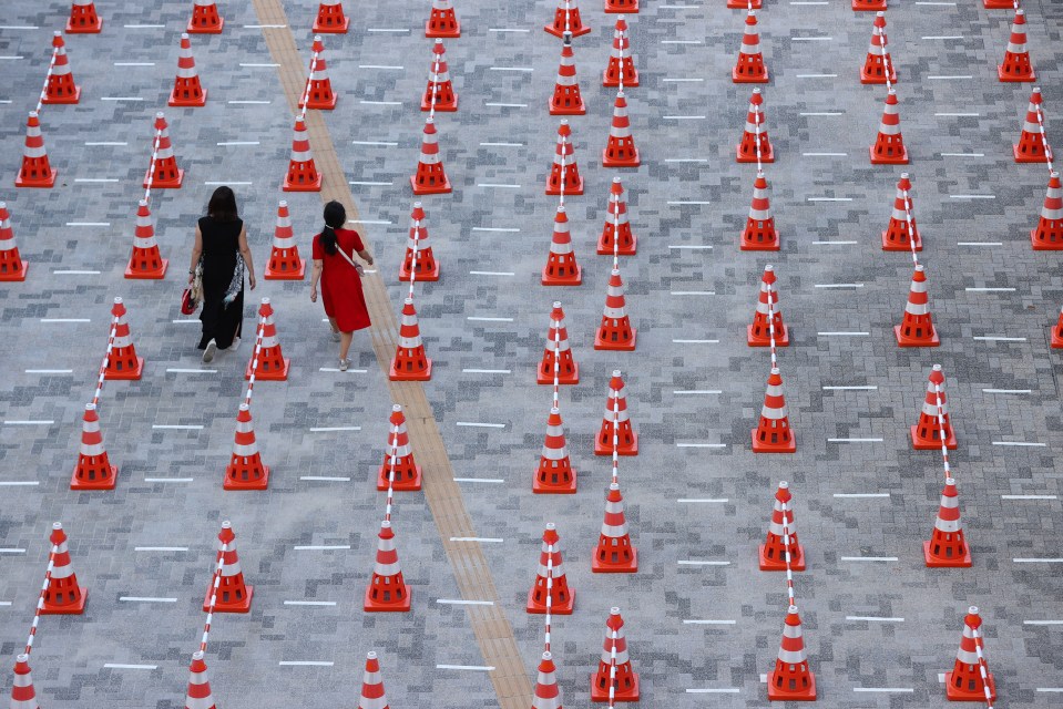 With Covid rates rising in the capital, the £13billion Games opened in an otherwise eerily quiet stadium