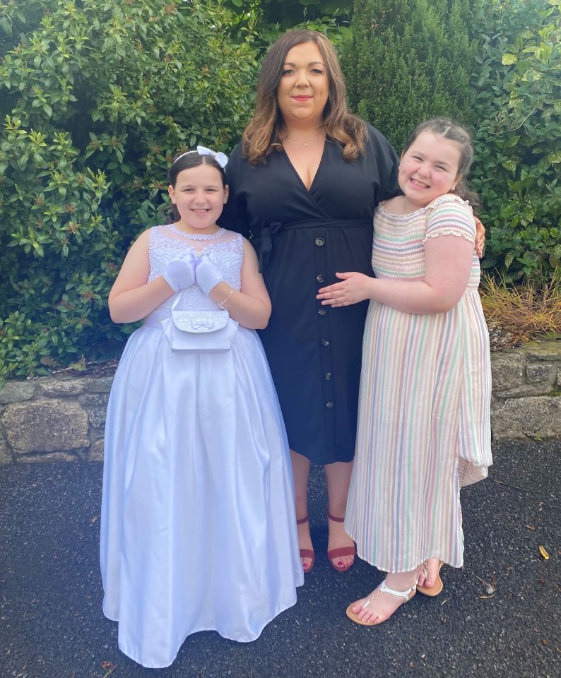 Danielle, pictured with her daughters, said: "I can't go out at all because if any sun touches my back, even through the bandage, the pain just makes me completely weak"