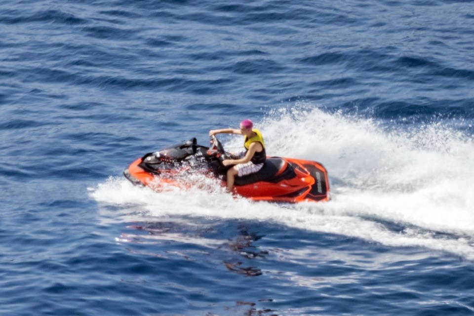 Cruz Beckham jet-skiing while on a family holiday in Italy