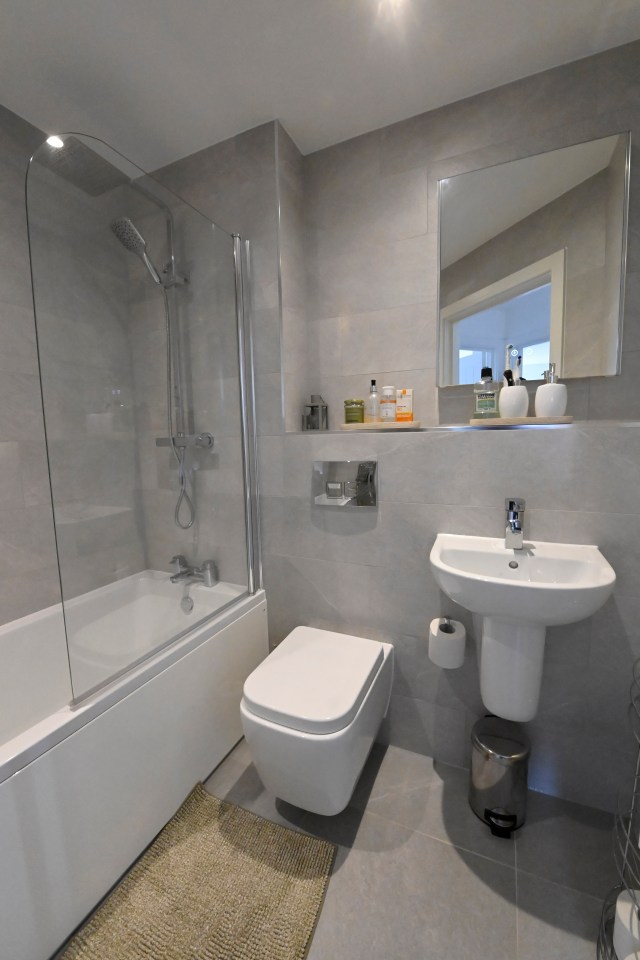 The flat comes with two bathrooms - one is an ensuite in the master bedroom