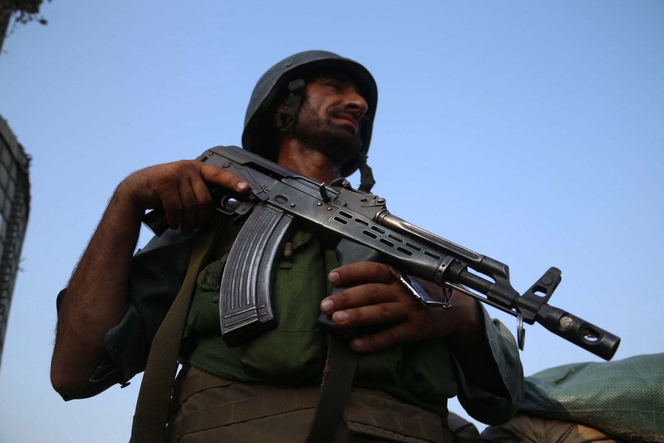 An Afghan security official at check point in Jalalabad