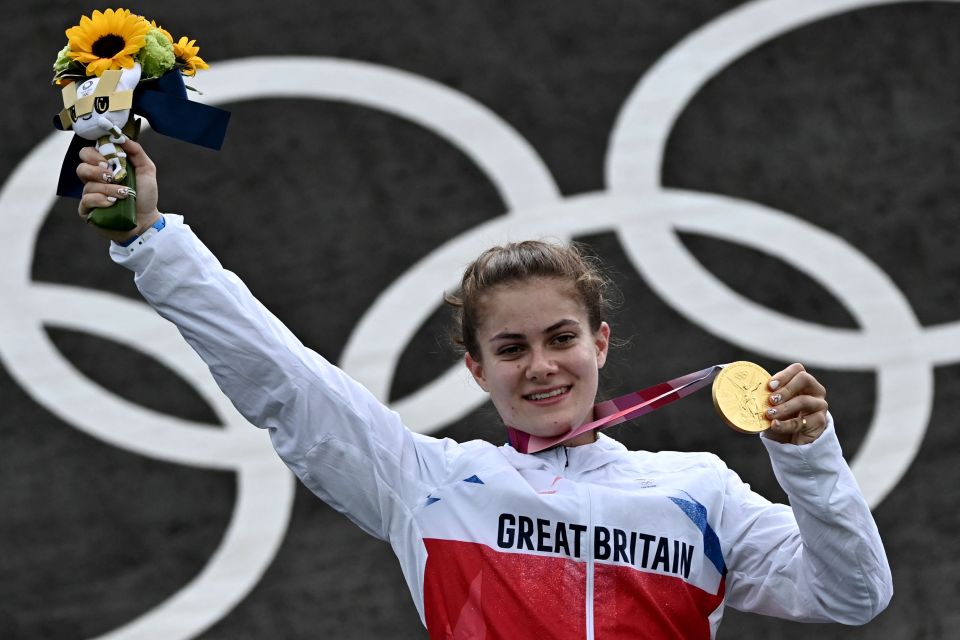 Shriever celebrates with her medal