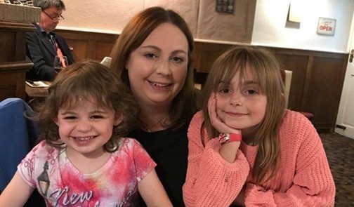 Family time: Lily, 5, mum Liz, and Ellie, 10 are excited to visit Walt Disney World Resort in 2022