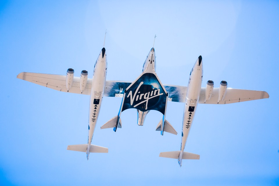 Virgin's rocket plane VSS Unity flies to 50,000ft strapped to a huge carrier plane