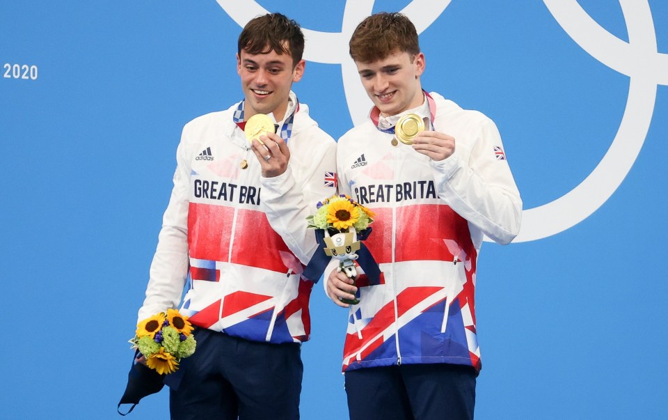 Team GB heroes Tom Daley, 27 and Matty Lee, 23, show off their gold medals