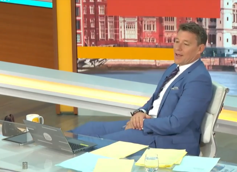 He had his injured leg up on a stool behind the GMB desk