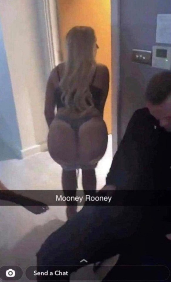 Rooney asleep in the hotel room as scantily clad women cavort around him